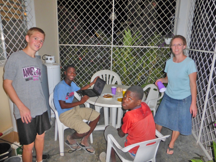 Meeting Nathanael, their sponsored child (seated at right) was a highlight of the trip!